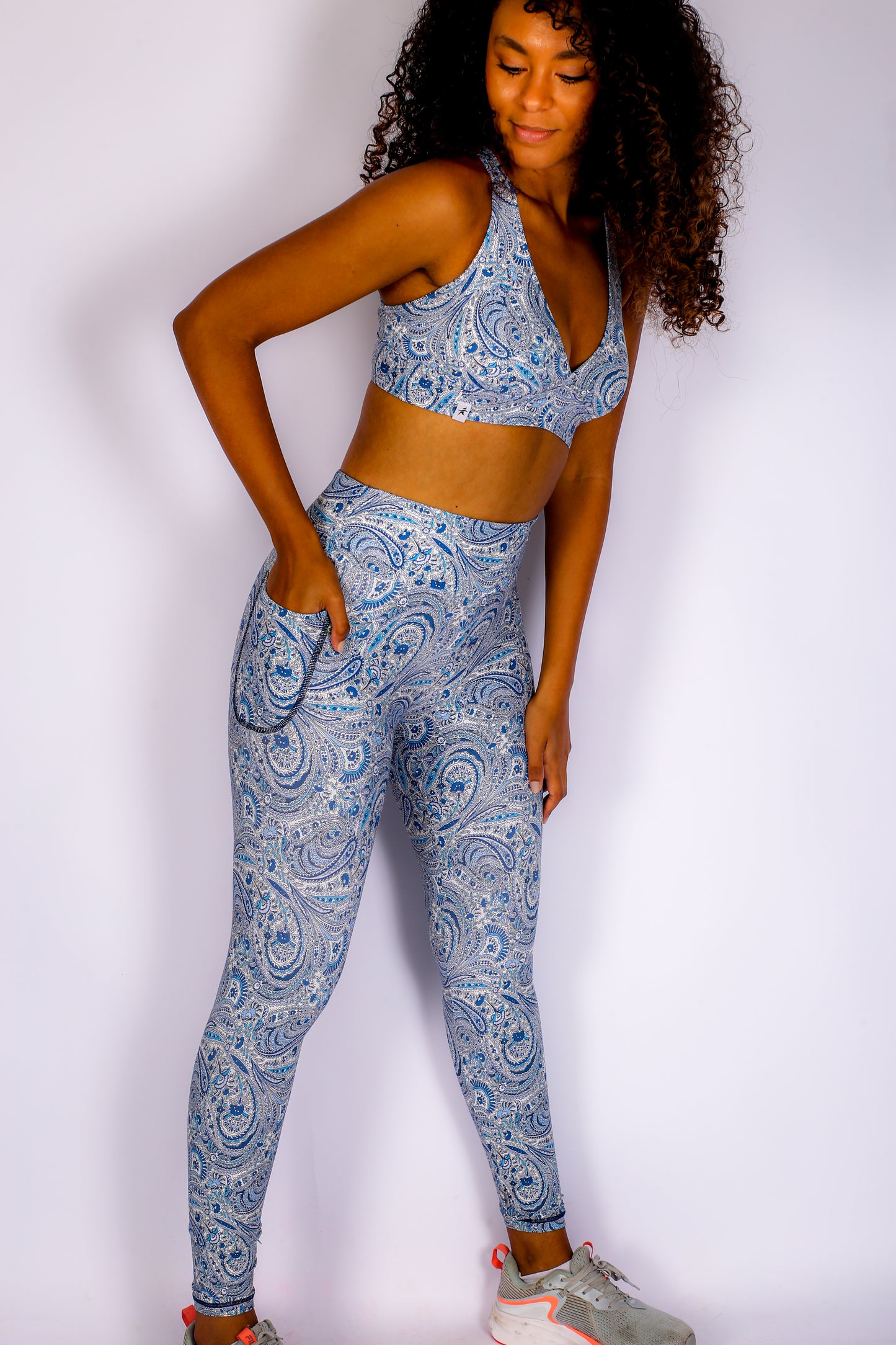 Blue Paisle Set Leggings with pockets and Sports bra cross in the